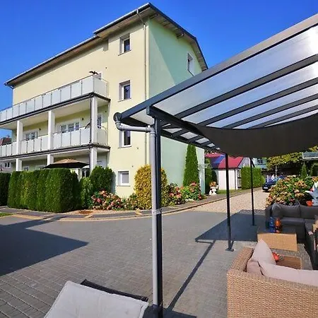 With A Balcony Very Close To The *